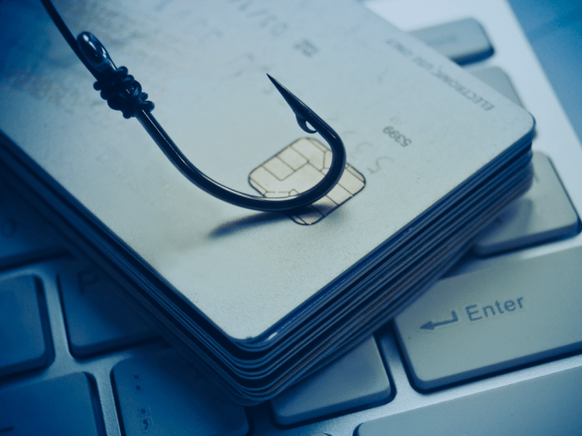 Credit cards at the laptop keyboard 