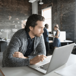 A man who's using a computer